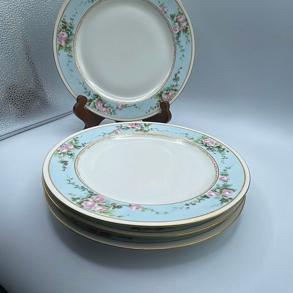 Set of 4 Haviland Limoges France floral edge plates.